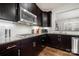 Modern kitchen featuring a gas cooktop, granite countertops, and stainless steel appliances at 6112 Canyon Trl, Denver, NC 28037