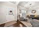 Welcoming living room with large windows providing ample natural light at 6112 Canyon Trl, Denver, NC 28037