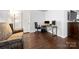 Office space with a hardwood floor, comfortable seating and a computer desk set up at 6112 Canyon Trl, Denver, NC 28037