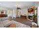 Inviting living room features a fireplace, hardwood floors, and open floor plan at 653 Camrose Ne Cir, Concord, NC 28025