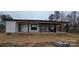 Relaxing covered back porch with sleek black support beams, perfect for outdoor living at 6855 Union Rd, Gastonia, NC 28056