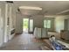 Open-concept living area with modern lighting and fireplace, ready for personalization at 6855 Union Rd, Gastonia, NC 28056