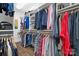 Spacious walk-in closet with custom shelving and ample storage space for clothing and accessories at 9223 Robbins Preserve Rd, Cornelius, NC 28031