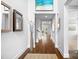 Inviting hallway with hardwood floors and elegant decor at 9223 Robbins Preserve Rd, Cornelius, NC 28031