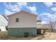 The home has a basement level and a wooden deck at 1003 Harris St, Kannapolis, NC 28081