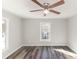 Bedroom with a ceiling fan, neutral paint, and window at 1003 Harris St, Kannapolis, NC 28081