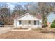 Charming single-story home with a welcoming front porch, well-maintained lawn and cozy curb appeal at 1003 Harris St, Kannapolis, NC 28081