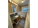 Cozy bathroom with a wood vanity, modern toilet, and a framed mirror and vanity lights at 122 E Hargrave St # 50, Wadesboro, NC 28170