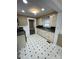 Clean kitchen featuring white cabinets, stainless steel appliances, and vinyl floors at 122 E Hargrave St # 50, Wadesboro, NC 28170