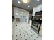 Clean kitchen featuring white cabinets, stainless steel appliances, and modern oven at 122 E Hargrave St # 50, Wadesboro, NC 28170