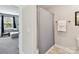 Clean bathroom featuring a shower with a curtain, a towel bar, and natural light at 16404 Mckee Ridge Dr, Charlotte, NC 28278