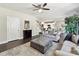 Open-concept living space featuring modern furniture and a clear view of the updated kitchen at 16404 Mckee Ridge Dr, Charlotte, NC 28278