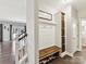 Well-lit mudroom boasts custom built-ins, offering ample storage and organization for a tidy transition space at 16404 Mckee Ridge Dr, Charlotte, NC 28278