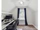 Comfortable home office space with a desk, office chair, and plenty of natural light at 16404 Mckee Ridge Dr, Charlotte, NC 28278