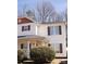 Charming two-story home with a cozy front porch and brown shutters, offering classic curb appeal at 1906 Bromwich Rd # B, Charlotte, NC 28208