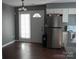This is a modern eat-in kitchen featuring stainless steel appliances and ample countertop space at 1906 Bromwich Rd # B, Charlotte, NC 28208