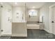 Sleek bathroom boasts a glass shower, soaking tub, and modern gray tile at 2125 Partridge Berry Ln, Rock Hill, SC 29730
