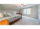 Bedroom with carpeted floor, a comfortable bed, and a window providing natural light at 2125 Partridge Berry Ln, Rock Hill, SC 29730