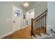 Inviting foyer with hardwood floors, stairs, and a view to other rooms at 2125 Partridge Berry Ln, Rock Hill, SC 29730