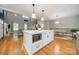 Open concept kitchen boasts a large island and seamless flow to the living and dining areas at 2125 Partridge Berry Ln, Rock Hill, SC 29730