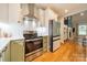 Stylish kitchen with white cabinets, stainless steel appliances, and subway tile backsplash at 2125 Partridge Berry Ln, Rock Hill, SC 29730