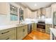 Well-lit kitchen featuring modern appliances, counter tops, and shaker cabinets at 2125 Partridge Berry Ln, Rock Hill, SC 29730