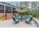 Comfortable patio featuring a seating area with a table and umbrella at 2125 Partridge Berry Ln, Rock Hill, SC 29730