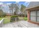 Backyard deck with nice outdoor views, shrubbery and brick exterior to enjoy the outdoors at 5125 Belicourt Dr, Charlotte, NC 28277