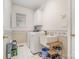 Functional laundry room with a sink, washer and dryer, and storage options at 5125 Belicourt Dr, Charlotte, NC 28277