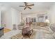 Inviting living room with views into the dining and entry areas at 5125 Belicourt Dr, Charlotte, NC 28277
