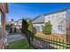Well-maintained backyard of house featuring a manicured lawn and fenced perimeter at 615 Bourton House Dr, Charlotte, NC 28211