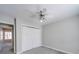 Comfortable bedroom with neutral walls, ceiling fan, and carpet floors at 702 Selma Burke Ln, Matthews, NC 28105