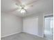 Bright bedroom with neutral walls, ceiling fan and closet at 702 Selma Burke Ln, Matthews, NC 28105