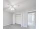 Spacious bedroom with neutral walls, ceiling fan and closet at 702 Selma Burke Ln, Matthews, NC 28105
