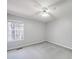 Bright bedroom featuring neutral walls, carpet, and natural light at 702 Selma Burke Ln, Matthews, NC 28105