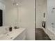 Bright bathroom features modern vanity, walk-in shower, and sleek fixtures for a contemporary look at 7111 Anchorage Ln, Tega Cay, SC 29708