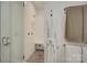 Modern bathroom featuring a glass door shower and neutral tiling at 7111 Anchorage Ln, Tega Cay, SC 29708