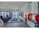Modern living room with large windows overlooking the lake at 7111 Anchorage Ln, Tega Cay, SC 29708