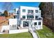 Stunning home featuring multiple balconies, a pool, and stairway to the yard at 7111 Anchorage Ln, Tega Cay, SC 29708