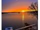 Spectacular sunrise view from the waterfront property highlighting scenic beauty and serenity at 7111 Anchorage Ln, Tega Cay, SC 29708