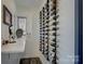 Wine cellar with modern wine rack and storage to accommodate a large wine collection at 7111 Anchorage Ln, Tega Cay, SC 29708
