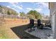 Large backyard with patio area, grill, and privacy fence perfect for outdoor entertaining at 757 Jones Branch Rd, Fort Mill, SC 29715