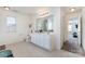 Bright bathroom with double sinks, a separate tub, and a shower, offering comfort and convenience at 757 Jones Branch Rd, Fort Mill, SC 29715