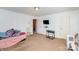 Cozy bedroom offering a serene atmosphere with neutral walls, carpet, and ample natural light, a restful retreat at 757 Jones Branch Rd, Fort Mill, SC 29715