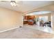 Open-concept living space with kitchen featuring stainless steel appliances and an adjacent dining area at 757 Jones Branch Rd, Fort Mill, SC 29715