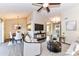 Open-concept living room and dining area with hardwood floors and ample natural light at 7804 Renaissance Ct # A, Charlotte, NC 28226