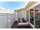 Secluded patio with tiled flooring, a privacy fence, and modern furniture offering a tranquil outdoor space at 7804 Renaissance Ct # A, Charlotte, NC 28226