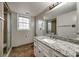 Bathroom featuring a glass-enclosed shower and granite countertop vanity at 8106 Sidras Ct, Charlotte, NC 28270