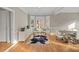 Bright dining room featuring hardwood floors, natural light, and neutral decor at 888 Craigmont Nw Ln, Concord, NC 28027