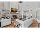 Spacious living area with stone fireplace and hardwood floors providing a cozy atmosphere at 888 Craigmont Nw Ln, Concord, NC 28027